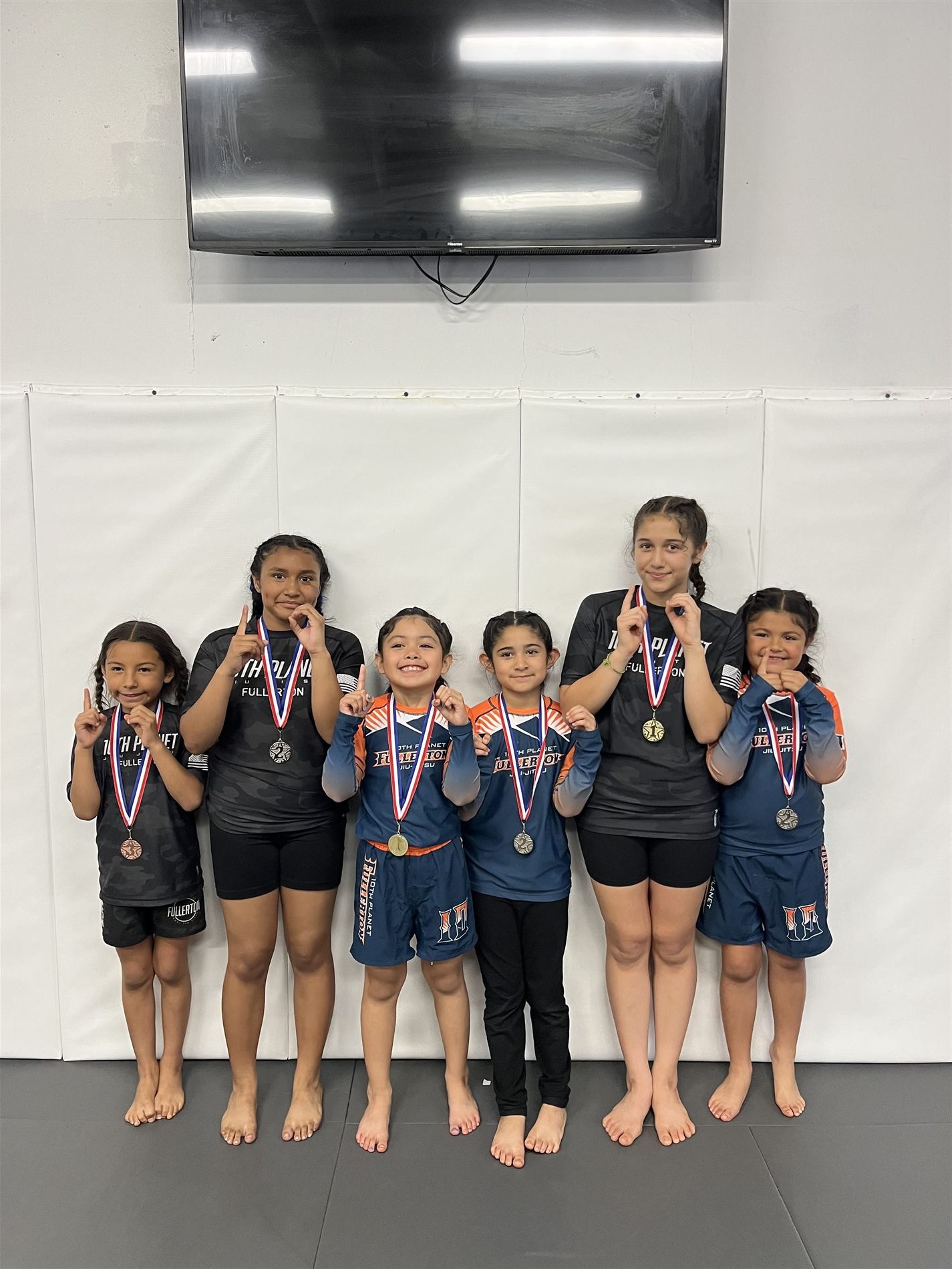 Youth jiu-jitsu competition team with medals at 10th Planet Fullerton